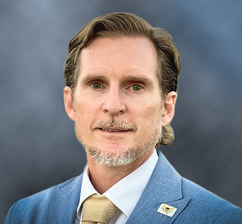 Russell-Pate-Headshot-w-Blue-BG-V2